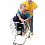 playing in grocery cart