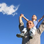 grandfather and grandson with cloud